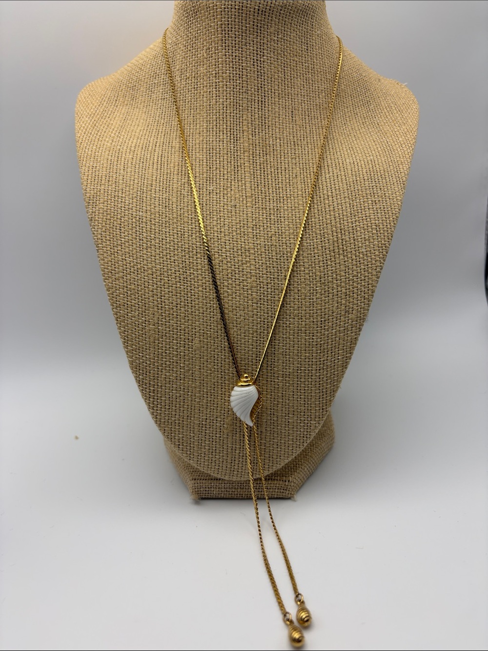 Vintage Avon Gold Lariat Necklace with White Shell Pendant